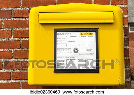 Stock Photo - "Letter box with collection times dependant on tidal conditions, small island of Langeness, North Frisia, Schleswig-Holstein, northern Germany, Germany, Europe". Fotosearch