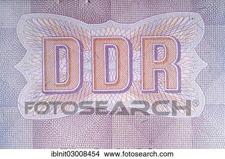 "Lettering """"DDR"""", in a passport from the German Democratic Republic, detail" View Large Photo Image Picture - "Lettering """"DDR"""", in a passport from the German Democratic Republic, detail". Fotosearch