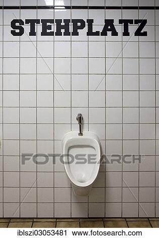 "Lettering """"Stehplatz"""", German for """"standing room"""" above the urinals of a men's toilet, Germany, Europe" View Large Photo Image Stock Image - "Lettering """"Stehplatz"""", German for """"standing room"""" above the urinals of a men's toilet, Germany, Europe". Fotosearch