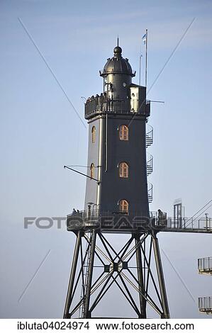 Picture - "Leuchtturm Obereversand Lighthouse, fishing port of Dorum-Neufeld, Lower Saxony, Germany, Europe". Fotosearch