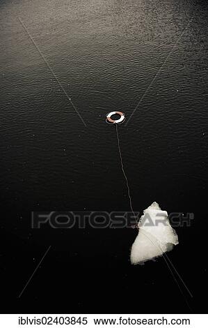 Stock Photography - Life buoy and floating ice. Fotosearch
