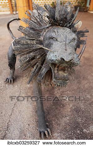 "Life-size lion figure made of metal, Foumban, Northwest Region, Cameroon, Africa" View Large Photo Image Stock Photo - "Life-size lion figure made of metal, Foumban, Northwest Region, Cameroon, Africa". Fotosearch