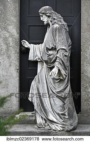 "Life-size sculpture, Jesus knocking on the door of a tomb, St. John's Cemetery, Nuremberg, Middle Franconia, Bavaria, Germany, Europe" View Large Photo Image Stock Photo - "Life-size sculpture, Jesus knocking on the door of a tomb, St. John's Cemetery, Nuremberg, Middle Franconia, Bavaria, Germany, Europe". Fotosearch