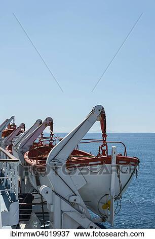 Stock Photo - "Lifeboats of a passenger ferry from Livorno to Bastia, Mediterranean Sea". Fotosearch