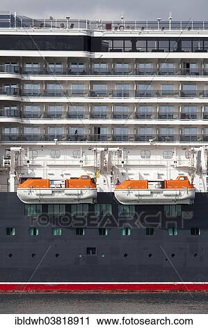 Stock Image - "Lifeboats on the cruise ship Queen Elizabeth, harbour, Warnemuende, Rostock, Mecklenburg-Vorpommern, Germany, Europe". Fotosearch