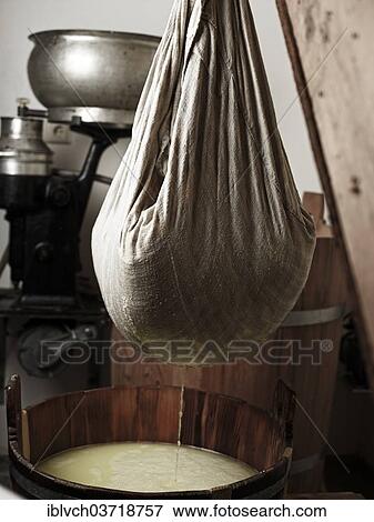 "Lifting and pressing curd with a cheese cloth, Steinbergalm, Inneralpbach, Alpbach, Tyrol, Austria, Europe" View Large Photo Image Stock Photo - "Lifting and pressing curd with a cheese cloth, Steinbergalm, Inneralpbach, Alpbach, Tyrol, Austria, Europe". Fotosearch