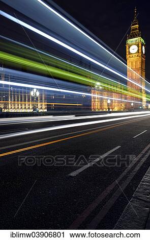 Stock Image - "Light trails in front of Elizabeth Tower or Big Ben, London, England, United Kingdom, Europe". Fotosearch