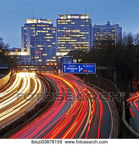 "Light trails of moving traffic at dusk, Ruhrschnellweg, A 40 motorway, Essen, Ruhr Area, North Rhine-Westphalia, Germany, Europe" View Large Photo Image Stock Photo - "Light trails of moving traffic at dusk, Ruhrschnellweg, A 40 motorway, Essen, Ruhr Area, North Rhine-Westphalia, Germany, Europe". Fotosearch