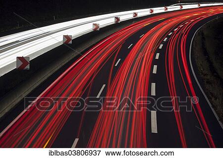 "Light trails on the A40 motorway at dusk, North Rhine-Westphalia, Germany, Europe" View Large Photo Image Stock Photo - "Light trails on the A40 motorway at dusk, North Rhine-Westphalia, Germany, Europe". Fotosearch