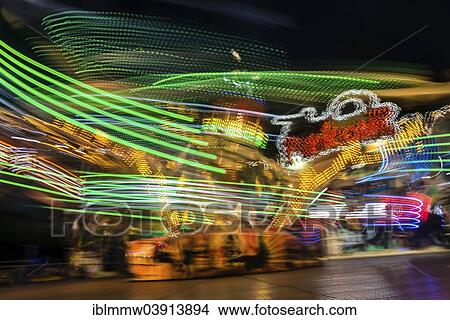 "Light trails, ride at night, Munich Spring Festival, Theresienwiese, Munich, Bavaria, Germany, Europe" View Large Photo Image Picture - "Light trails, ride at night, Munich Spring Festival, Theresienwiese, Munich, Bavaria, Germany, Europe". Fotosearch