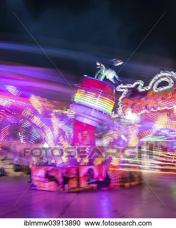 "Light trails, ride at night, Munich Spring Festival, Theresienwiese, Munich, Bavaria, Germany, Europe" View Large Photo Image Stock Image - "Light trails, ride at night, Munich Spring Festival, Theresienwiese, Munich, Bavaria, Germany, Europe". Fotosearch