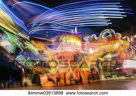 "Light trails, ride at night, Munich Spring Festival, Theresienwiese, Munich, Bavaria, Germany, Europe" View Large Photo Image Stock Photo - "Light trails, ride at night, Munich Spring Festival, Theresienwiese, Munich, Bavaria, Germany, Europe". Fotosearch