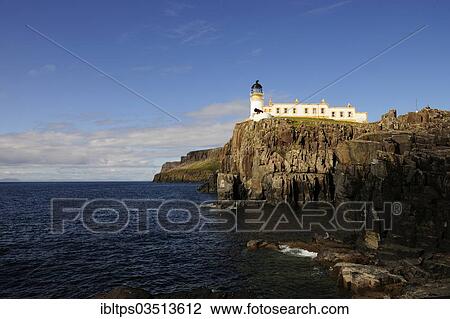 Stock Image - "Lighthouse at Neist Point on the steep basalt cliffs, Isle of Skye, Inner Hebrides, Scotland, United Kingdom, Europe". Fotosearch