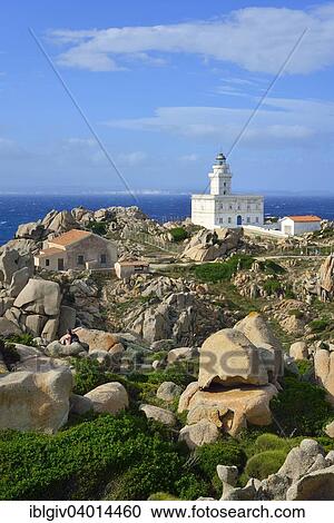 Stock Image - "Lighthouse at the cape, Corsica on the horizon, Capo Testa, Province of Olbia-Tempio, Sardinia, Italy, Europe". Fotosearch