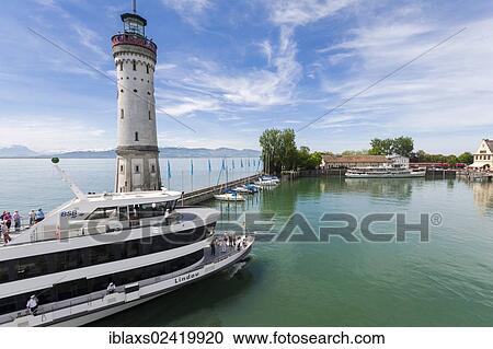Lighthouse at the harbor entrance of Lindau on Lake Constance with the MS Lindau excursion boat, Lindau, Bavaria, Germany, Europe, PublicGround, Europe View Large Photo Image Stock Image - Lighthouse at the harbor entrance of Lindau on Lake Constance with the MS Lindau excursion boat, Lindau, Bavaria, Germany, Europe, PublicGround, Europe. Fotosearch
