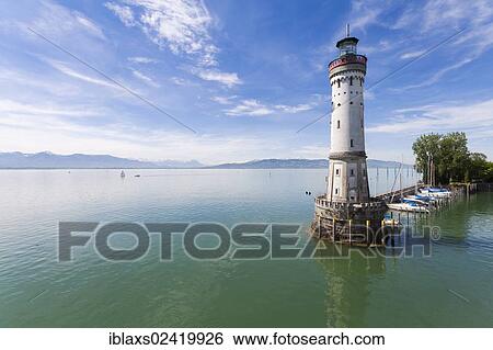 Stock Photograph - Lighthouse at the harbor entrance of Lindau on Lake Constance, Bavaria, Germany, Europe, PublicGround, Europe. Fotosearch