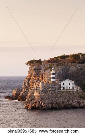 "Lighthouse at the harbour entrance, Port de Soller, Majorca, Balearic Islands, Spain, Europe" View Large Photo Image Stock Photography - "Lighthouse at the harbour entrance, Port de Soller, Majorca, Balearic Islands, Spain, Europe". Fotosearch