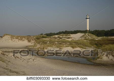 "Lighthouse behind sand dunes, Dueodde, Bornholm, Capital Region of Denmark, Denmark, Europe" View Large Photo Image Stock Image - "Lighthouse behind sand dunes, Dueodde, Bornholm, Capital Region of Denmark, Denmark, Europe". Fotosearch