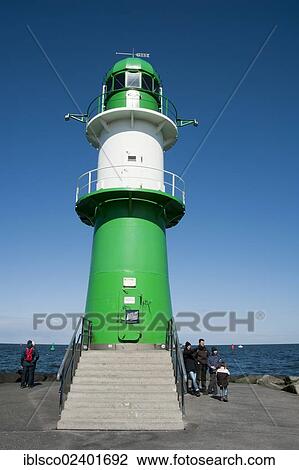Stock Image - "Lighthouse on the Warnow River estuary, Warnemuende, Mecklenburg-Western Pomerania, Germany, Europe". Fotosearch