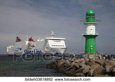 "Lighthouse on the western pier and a Stena Line ferry, Warnemunde, Rostock, Mecklenburg-Western Pomerania, Germany, Europe" View Large Photo Image Stock Image - "Lighthouse on the western pier and a Stena Line ferry, Warnemunde, Rostock, Mecklenburg-Western Pomerania, Germany, Europe". Fotosearch