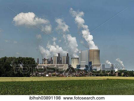 "Lignite-fired power station, residential buildings and arable land at the front, Bergheim-Niederaussem, North Rhine-Westphalia, Germany, Europe" View Large Photo Image Stock Photo - "Lignite-fired power station, residential buildings and arable land at the front, Bergheim-Niederaussem, North Rhine-Westphalia, Germany, Europe". Fotosearch