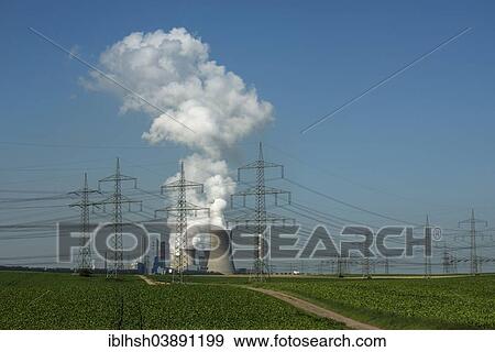 "Lignite-fired power station, with arable land at the front, power lines cutting through the landscape, Bergheim-Niederaussem, North Rhine-Westphalia, Germany, Europe" View Large Photo Image Stock Photo - "Lignite-fired power station, with arable land at the front, power lines cutting through the landscape, Bergheim-Niederaussem, North Rhine-Westphalia, Germany, Europe". Fotosearch