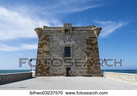 Stock Image - "Ligny Tower or Torre di Ligny, now a museum, city fortifications by the sea, Trapani, Sicily, Italy, Europe". Fotosearch