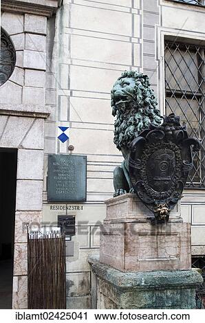 Lion sculpture in front of the Munich Residence, Residenzstrasse 1, the lower lip of the lion looking polished as it is rubbed for good luck, Munich Bavaria, Germany, Europe View Large Photo Image Stock Image - Lion sculpture in front of the Munich Residence, Residenzstrasse 1, the lower lip of the lion looking polished as it is rubbed for good luck, Munich Bavaria, Germany, Europe. Fotosearch