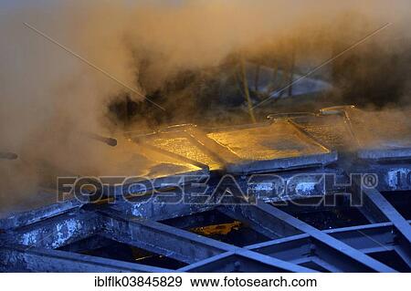 "Liquid silver is being poured into molds, Doe Run ironworks, La Oroya, Junin, Peru, South America" View Large Photo Image Stock Photo - "Liquid silver is being poured into molds, Doe Run ironworks, La Oroya, Junin, Peru, South America". Fotosearch