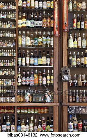 "Liquour store with a large selection of cachaca bottles, Brazilian sugarcane liquour, Paraty, Rio de Janeiro State, Brazil, South America" View Large Photo Image Stock Image - "Liquour store with a large selection of cachaca bottles, Brazilian sugarcane liquour, Paraty, Rio de Janeiro State, Brazil, South America". Fotosearch