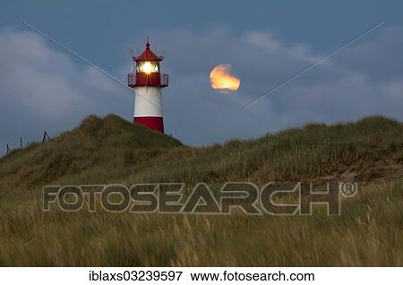 Stock Photo - "List Ost lighthouse at dusk with the full moon, List, Hannover, Lower Saxony, Germany, Europe". Fotosearch