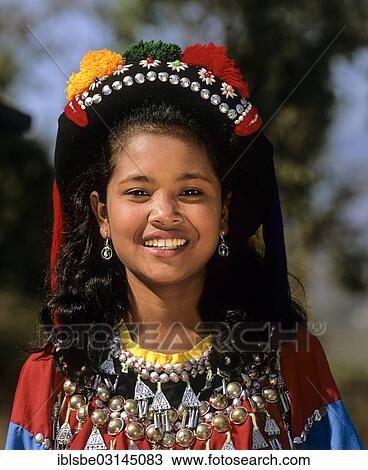 "Lisu girl wearing a colourful headdress and the traditional costume of the mountain people, portrait, Mae Sai, Chiang Rai Province, Northern Thailand, Thailand, Asia" View Large Photo Image Stock Image - "Lisu girl wearing a colourful headdress and the traditional costume of the mountain people, portrait, Mae Sai, Chiang Rai Province, Northern Thailand, Thailand, Asia". Fotosearch