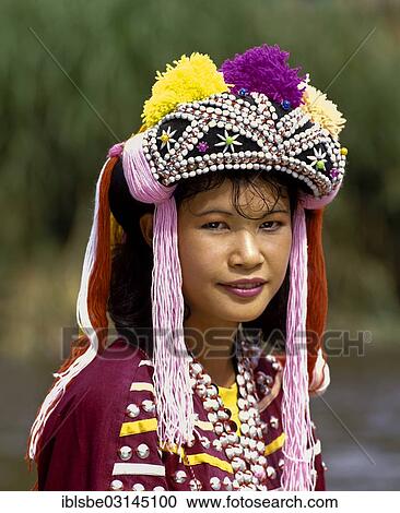 "Lisu girl wearing a colourful headdress and the traditional costume of the mountain people, portrait, Mae Sai, Chiang Rai Province, Northern Thailand, Thailand, Asia" View Large Photo Image Stock Image - "Lisu girl wearing a colourful headdress and the traditional costume of the mountain people, portrait, Mae Sai, Chiang Rai Province, Northern Thailand, Thailand, Asia". Fotosearch