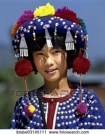 "Lisu girl wearing a colourful headdress and the traditional costume of the mountain people, portrait, Mae Sai, Chiang Rai Province, Northern Thailand, Thailand, Asia" View Large Photo Image Stock Image - "Lisu girl wearing a colourful headdress and the traditional costume of the mountain people, portrait, Mae Sai, Chiang Rai Province, Northern Thailand, Thailand, Asia". Fotosearch