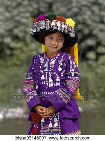 "Lisu girl wearing a colourful headdress and the traditional costume of the mountain people, portrait, Mae Sai, Chiang Rai Province, Northern Thailand, Thailand, Asia" View Large Photo Image Stock Photo - "Lisu girl wearing a colourful headdress and the traditional costume of the mountain people, portrait, Mae Sai, Chiang Rai Province, Northern Thailand, Thailand, Asia". Fotosearch