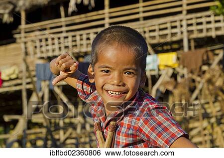 "Little boy of the Adi Gallo tribe in the hills of Arunachal Pradesh, Angu Village, India, Asia" View Large Photo Image Stock Photograph - "Little boy of the Adi Gallo tribe in the hills of Arunachal Pradesh, Angu Village, India, Asia". Fotosearch