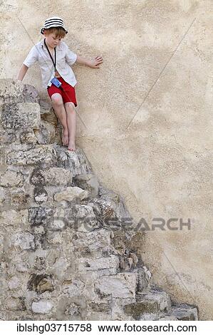 "Little boy on stone steps, Rab, Rab, Primorje-Gorski Kotar, Croatia, Europe" View Large Photo Image Stock Photo - "Little boy on stone steps, Rab, Rab, Primorje-Gorski Kotar, Croatia, Europe". Fotosearch