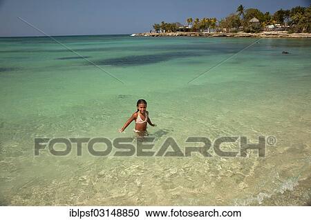 "Little Cuban girl on Playa Bacuranao beach, Playas del Este, Habana del Este, Havana, Havana Province, Cuba, North America" View Large Photo Image Stock Image - "Little Cuban girl on Playa Bacuranao beach, Playas del Este, Habana del Este, Havana, Havana Province, Cuba, North America". Fotosearch