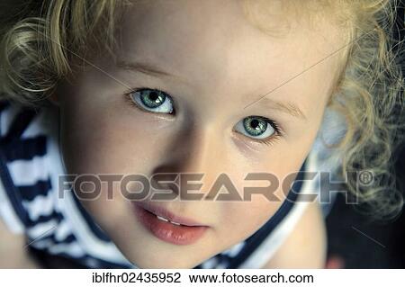Stock Image - "Little girl, portrait, Germany, Europe". Fotosearch