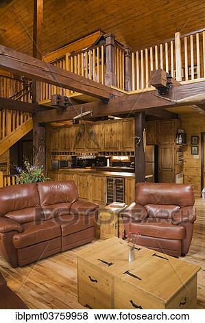 "Living room inside a Canadiana cottage, a white pine log home, Quebec Province, Canada, North America" View Large Photo Image Stock Photo - "Living room inside a Canadiana cottage, a white pine log home, Quebec Province, Canada, North America". Fotosearch