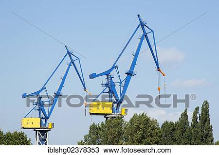 Stock Image - "Loading cranes, harbour, Hamburg, Germany, Europe". Fotosearch
