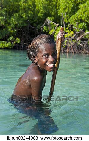 "Local boy in the water of the Marovo Lagoon, Marovo Lagoon, Western Province, Solomon Islands, Oceania" View Large Photo Image Stock Image - "Local boy in the water of the Marovo Lagoon, Marovo Lagoon, Western Province, Solomon Islands, Oceania". Fotosearch