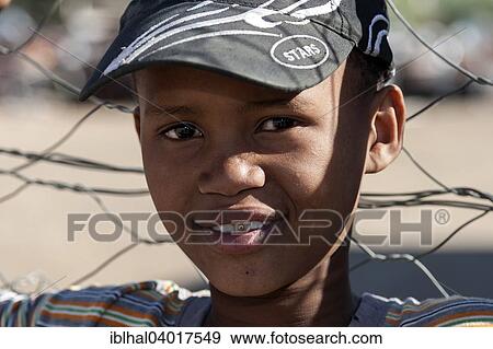 "Local boy with baseball cap, portrait, Keetmanshoop, Namibia, Africa" View Large Photo Image Stock Photo - "Local boy with baseball cap, portrait, Keetmanshoop, Namibia, Africa". Fotosearch