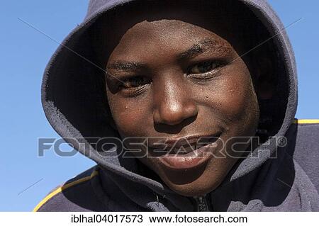 "Local boy with hood, portrait, Luderitz, Namibia, Africa" View Large Photo Image Stock Image - "Local boy with hood, portrait, Luderitz, Namibia, Africa". Fotosearch