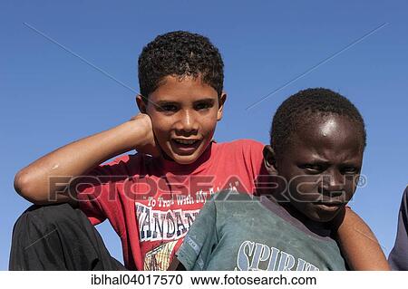 "Local boys, Luderitz, Namibia, Africa" View Large Photo Image Stock Image - "Local boys, Luderitz, Namibia, Africa". Fotosearch