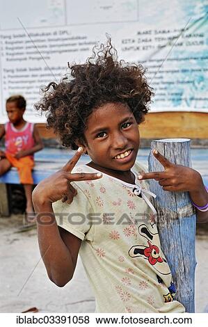 "Local child, Arborek, Raja Ampat, West Papua, Indonesia, Asia" View Large Photo Image Stock Photo - "Local child, Arborek, Raja Ampat, West Papua, Indonesia, Asia". Fotosearch