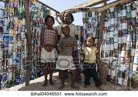 "Local children in front of a wall of beverage cans, near Spitzkoppe, Namibia, Africa" View Large Photo Image Stock Image - "Local children in front of a wall of beverage cans, near Spitzkoppe, Namibia, Africa". Fotosearch