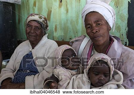 "Local family, grandmother, mother and children, near Spitzkoppe, Namibia, Africa" View Large Photo Image Stock Photo - "Local family, grandmother, mother and children, near Spitzkoppe, Namibia, Africa". Fotosearch