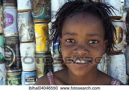 "Local girl front of beverage cans, portrait, near Spitzkoppe, Namibia, Africa" View Large Photo Image Stock Image - "Local girl front of beverage cans, portrait, near Spitzkoppe, Namibia, Africa". Fotosearch