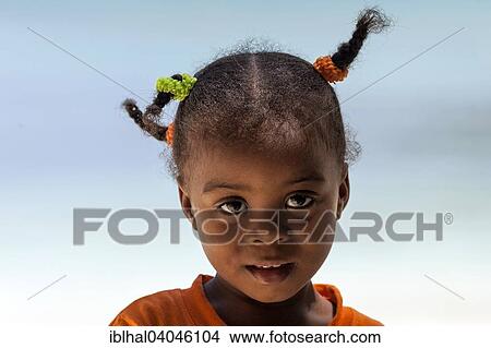 "Local girl with pigtails, portrait, Mahe Island, Seychelles, Africa" View Large Photo Image Picture - "Local girl with pigtails, portrait, Mahe Island, Seychelles, Africa". Fotosearch